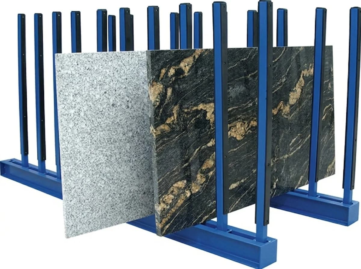 Stone slabs arranged in a blue storage rack